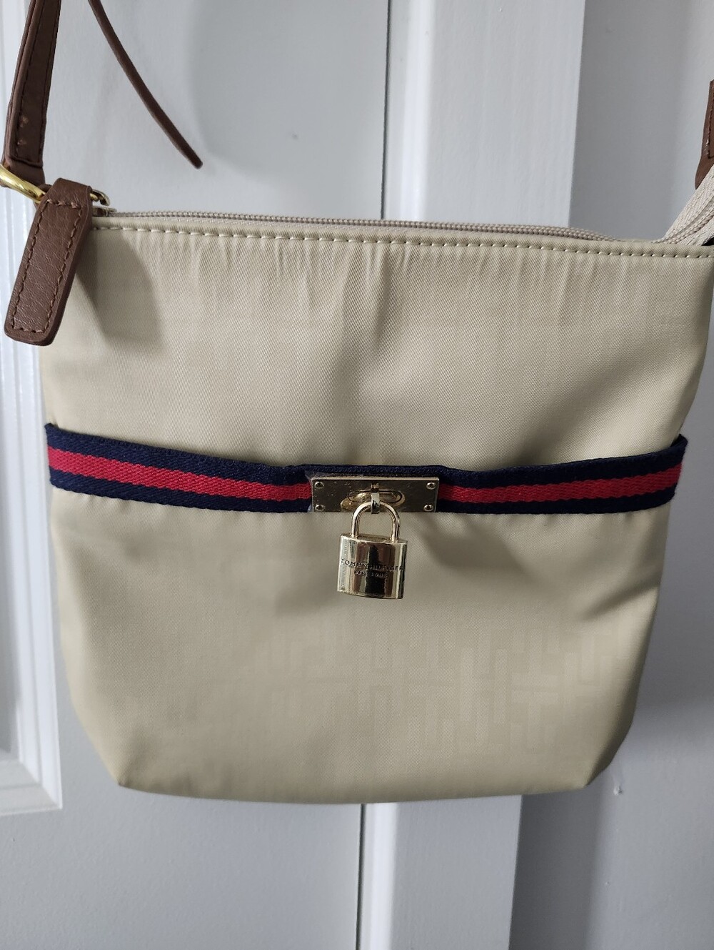 Tommy Hilfiger Beige Crossbody Bag with Red & Navy Stripe and Gold Padlock